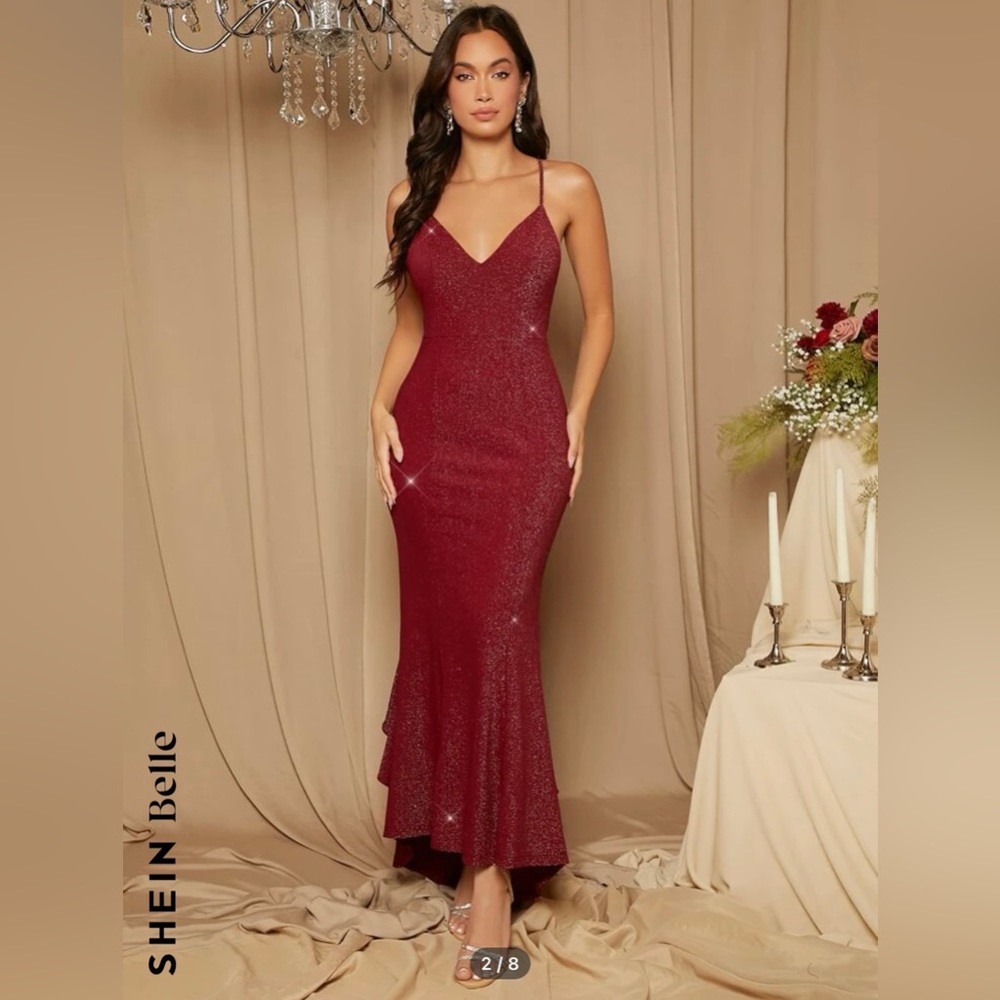 Prom dress, color is actually burgundy, size medium long in the back.